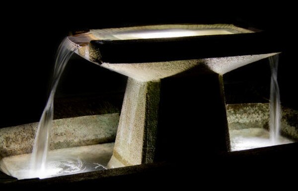 Art Deco Cement Fountain Rectangular floret corners lighting throughout
